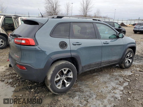 2014 Jeep Cherokee Trailhawk with VIN 1C4PJMBB9EW251749, listed as a Copart auction lot 49712915 with 94,289 mi miles and Clean Title. Bid and sale history available at carsss.com. Image 3.