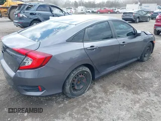 2016 Honda Civic Sedan LX with VIN 19XFC2F57GE250093, listed as a IAAI auction lot 41897786 with 106,966 mi miles. Bid and sale history available at carsss.com. Image 4.
