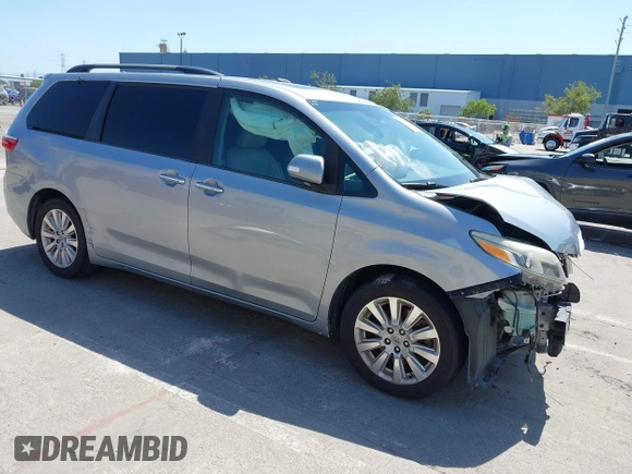 2015 Toyota Sienna XLE with VIN 5TDYK3DC5FS594514, listed as a IAAI auction lot 42183673 with 120,978 mi miles and . Bid and sale history available at DreamBid. Image 1.
