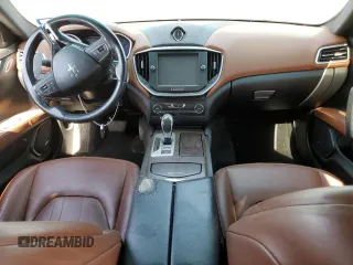 2016 Maserati Ghibli S Q4 с VIN ZAM57RTA7G1176988, выставлен на аукционе Copart как лот 51571535 с пробегом 123 383 миль миль и Чистый • Clean title. История ставок и продаж доступна на DreamBid. Изображение 8.