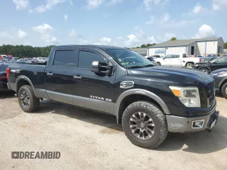 2016 Nissan Titan Platinum Reserve with VIN 1N6BA1F40GN512437, listed as a Copart auction lot 63521325 with 203,879 mi miles and Clean title. Bid and sale history available at DreamBid. Image 4.