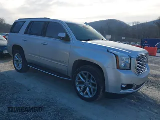 2019 GMC Yukon SLT with VIN 1GKS2BKC0KR107722, listed as a IAAI auction lot 41663341 with 111,782 mi miles. Bid and sale history available at carsss.com. Image 1.