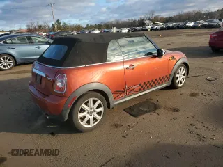 2012 MINI Convertible z VIN WMWZN3C57CT265368, wystawiony jako Copart lot #87100414 z przebiegiem 124 102 mil mil oraz Szkoda całkowita • Salvage title. Historia ofert i sprzedaży dostępna na DreamBid. Obrazek 3.