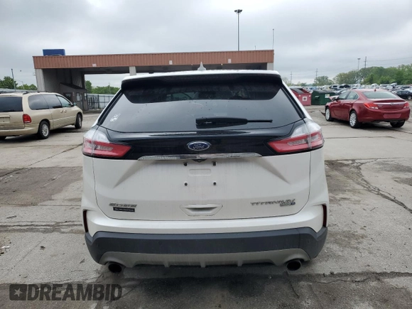 2019 Ford Edge Titanium z VIN 2FMPK4K94KBB36107, wystawiony jako Copart lot #56842925 z przebiegiem 75 348 mil mil oraz Szkoda całkowita • Salvage title. Historia ofert i sprzedaży dostępna na DreamBid. Obrazek 6.