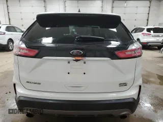2020 Ford Edge SEL z VIN 2FMPK4J90LBB13748, wystawiony jako Copart lot #65687415 z przebiegiem 108 629 mil mil oraz Czysty tytuł • Clean title. Historia ofert i sprzedaży dostępna na DreamBid. Obrazek 6.