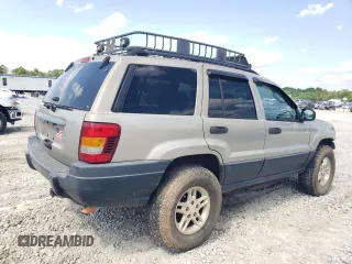 2004 Jeep Grand Cherokee Laredo z VIN 1J4GW48S84C177274, wystawiony jako Copart lot #56468855 z przebiegiem 236 014 mil mil oraz Szkoda całkowita • Salvage title. Historia ofert i sprzedaży dostępna na DreamBid. Obrazek 3.