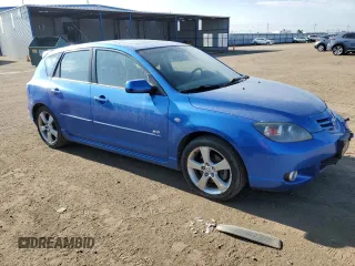2006 Mazda 3 S Grand Touring with VIN JM1BK343861434940, listed as a Copart auction lot 63624024 with 56,737 mi miles and Salvage Title. Bid and sale history available at DreamBid. Image 4.