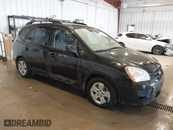 2009 Kia Rondo LX with VIN KNAFG528297278647, listed as a IAAI auction lot 42139810 with 161,314 mi miles. Bid and sale history available at carsss.com. Image 1.