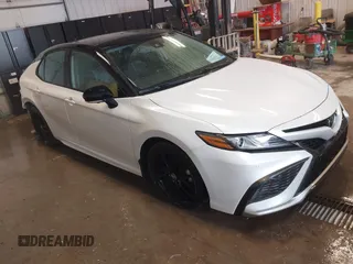 2022 Toyota Camry TRD with VIN 4T1KZ1AK7NU068652, listed as a IAAI auction lot 41508539 with 67,193 mi miles and . Bid and sale history available at DreamBid. Image 1.