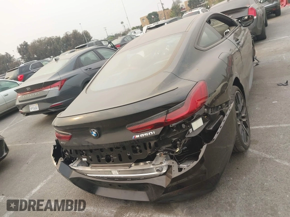 2024 BMW 8 Series M850i xDrive with VIN WBABC4C01RCR35247, listed as a IAAI auction lot 41266501 with 2,416 mi miles. Bid and sale history available at carsss.com. Image 16.