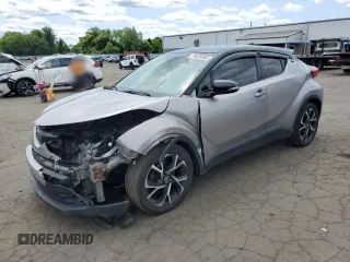 2019 Toyota C-HR XLE z VIN NMTKHMBX9KR088449, wystawiony jako Copart lot #59338965 z przebiegiem 133 402 mil mil oraz Szkoda całkowita • Salvage title. Historia ofert i sprzedaży dostępna na DreamBid. Obrazek 1.