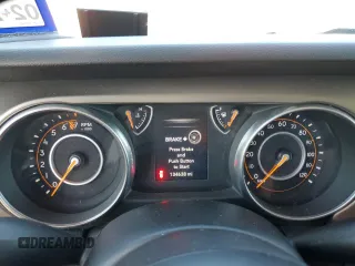 2018 Jeep Wrangler Unlimited Sport S with VIN 1C4HJXDG8JW227693, listed as a Copart auction lot 56694565 with 134,638 mi miles and Salvage title. Bid and sale history available at DreamBid. Image 9.