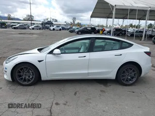 2021 Tesla Model 3 Long Range with VIN 5YJ3E1EB8MF860282, listed as a IAAI auction lot 41787008 with 49,730 mi miles and . Bid and sale history available at DreamBid. Image 14.