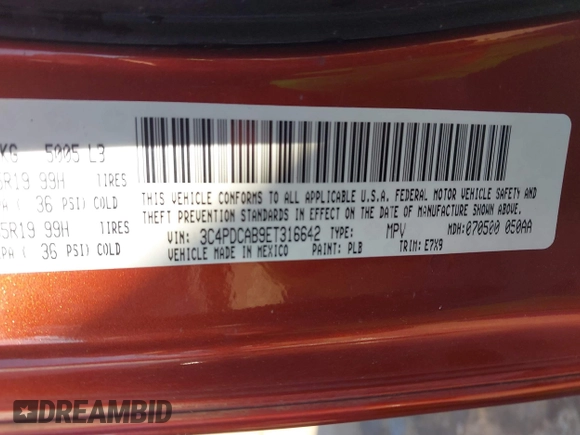 2014 Dodge Journey American Value Pkg with VIN 3C4PDCAB9ET316642, listed as a IAAI auction lot 42050437 with 184,742 mi miles. Bid and sale history available at carsss.com. Image 9.