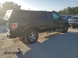 2009 Ford F-150 STX with VIN 1FTRX14W69FA23543, listed as a Copart auction lot 52314695 with 149,268 mi miles and Salvage Title. Bid and sale history available at DreamBid. Image 3.