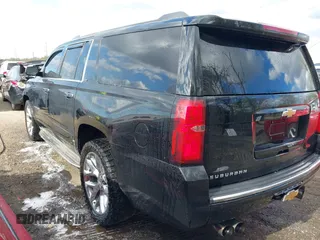2015 Chevrolet Suburban LTZ with VIN 1GNSKKKC5FR255373, listed as a IAAI auction lot 42012528 with 219,030 mi miles and . Bid and sale history available at DreamBid. Image 3.