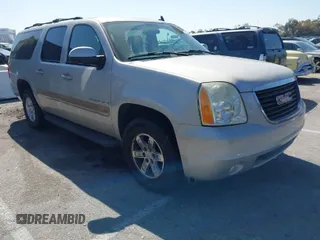 2007 GMC Yukon XL SLT with VIN 1GKFC16077R187116, listed as a IAAI auction lot 42020184 with 195,721 mi miles. Bid and sale history available at carsss.com. Image 1.