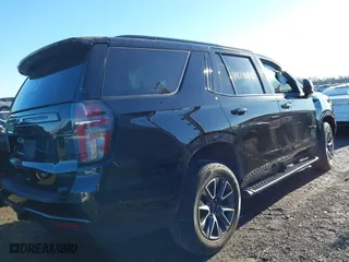 2021 Chevrolet Tahoe Z71 with VIN 1GNSKPKD1MR460353, listed as a IAAI auction lot 41427602 with 56,635 mi miles. Bid and sale history available at carsss.com. Image 4.