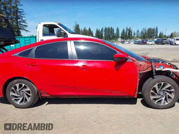 2016 Honda Civic EX with VIN 2HGFC2F79GH575920, listed as a IAAI auction lot 42074891 with 95,962 mi miles and . Bid and sale history available at DreamBid. Image 14.