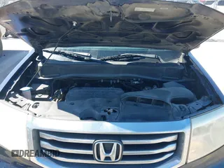2013 Honda Pilot Touring with VIN 5FNYF3H94DB018384, listed as a IAAI auction lot 41672767 with 188,922 mi miles and . Bid and sale history available at DreamBid. Image 10.