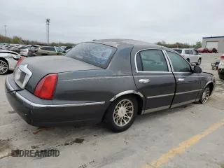 2001 Lincoln Town Car Signature with VIN 1LNHM82W11Y683915, listed as a Copart auction lot 50395865 with Not provided miles and Non repairable. Bid and sale history available at DreamBid. Image 3.
