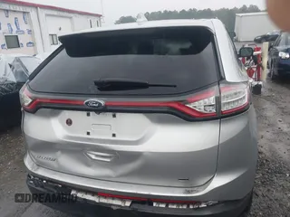 2015 Ford Edge SE z VIN 2FMTK4G84FBC18732, wystawiony jako IAAI lot #40458954 z przebiegiem 145 045 mil mil oraz . Historia ofert i sprzedaży dostępna na DreamBid. Obrazek 16.