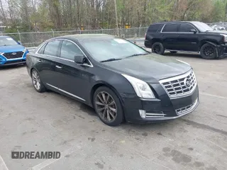2013 Cadillac XTS Luxury with VIN 2G61P5S37D9198756, listed as a IAAI auction lot 41953176 with 246,134 mi miles. Bid and sale history available at carsss.com. Image 1.