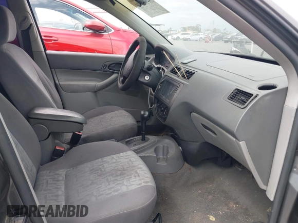2005 Ford Focus SE with VIN 1FAFP36N65W305152, listed as a IAAI auction lot 42064504 with 280,811 mi miles and . Bid and sale history available at carsss.com. Image 5.