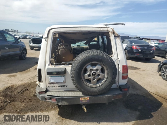 1994 Land Rover Discovery with VIN SALJY1283RA087219, listed as a Copart auction lot 52432815 with Not Provided miles and Salvage Title. Bid and sale history available at DreamBid. Image 6.
