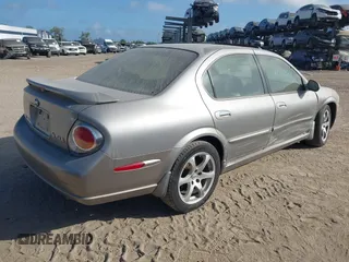 2003 Nissan Maxima GLE z VIN JN1DA31A83T411224, wystawiony jako IAAI lot #41905714 z przebiegiem Nie podano mil oraz . Historia ofert i sprzedaży dostępna na DreamBid. Obrazek 4.