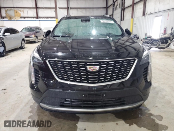 2020 Cadillac XT4 FWD Premium Luxury z VIN 1GYFZCR41LF143039, wystawiony jako Copart lot #57164005 z przebiegiem 24 218 mil mil oraz Nie do naprawy • Non repairable. Historia ofert i sprzedaży dostępna na DreamBid. Obrazek 5.