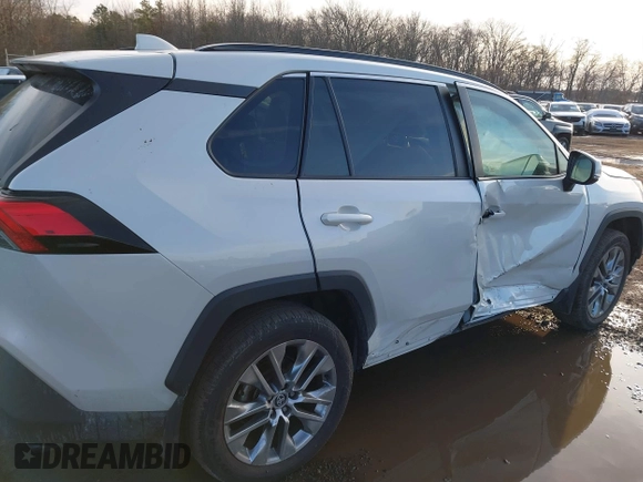 2021 Toyota RAV4 XLE Premium z VIN 2T3A1RFV2MW217009, wystawiony jako IAAI lot #41526066 z przebiegiem 36 619 mil mil oraz . Historia ofert i sprzedaży dostępna na DreamBid. Obrazek 17.