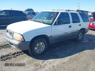 1999 GMC Jimmy SL with VIN 1GKCS13W9X2518799, listed as a IAAI auction lot 41724362 with 1 mi miles. Bid and sale history available at carsss.com. Image 2.