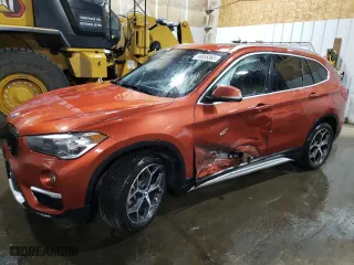 2018 BMW X1 xDrive28i with VIN WBXHT3C37J5L25365, listed as a Copart auction lot 50056365 with NaN miles and Salvage Title. Bid and sale history available at carsss.com. Image 1.