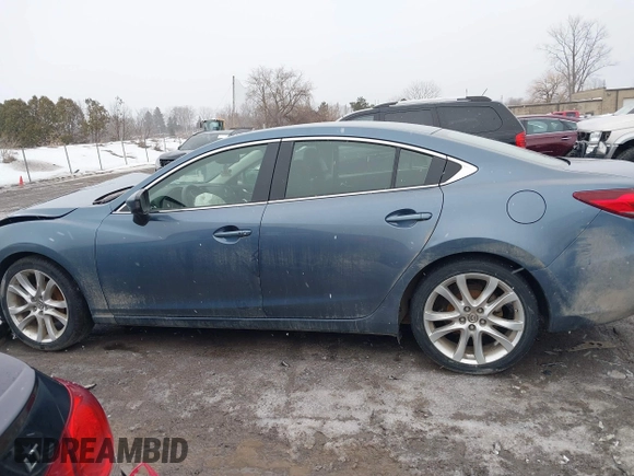 2014 Mazda 6 i Touring with VIN JM1GJ1T53E1112768, listed as a IAAI auction lot 41727440 with 166,081 mi miles and . Bid and sale history available at DreamBid. Image 15.
