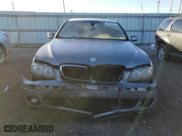 2006 BMW 7 Series 750i with VIN WBAHL83596DT03728, listed as a Copart auction lot 87855795 with 127,513 mi miles and Salvage title. Bid and sale history available at DreamBid. Image 5.