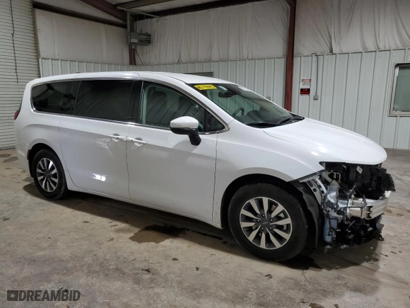 2023 Chrysler Pacifica Hybrid Touring L with VIN 2C4RC1L70PR608758, listed as a Copart auction lot 45183845 with 38,461 mi miles and Salvage Title. Bid and sale history available at carsss.com. Image 4.