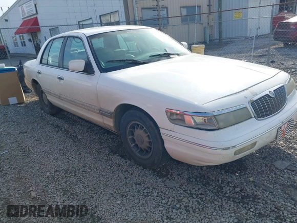 1997 Mercury Grand Marquis LS with VIN 2MELM75W5VX715872, listed as a IAAI auction lot 41612631 with 202,743 mi miles and . Bid and sale history available at DreamBid. Image 1.