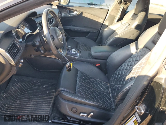 2018 Audi S7 Prestige z VIN WAU2FAFC1JN003800, wystawiony jako Copart lot #40875184 z przebiegiem 65 945 mil mil oraz . Historia ofert i sprzedaży dostępna na DreamBid. Obrazek 7.