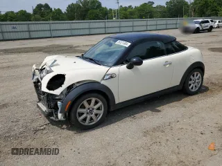 2014 MINI Coupe S z VIN WMWSX3C5XET409347, wystawiony jako Copart lot #56321384 z przebiegiem 81 070 mil mil oraz Szkody całkowita. Historia ofert i sprzedaży dostępna na DreamBid. Obrazek 1.