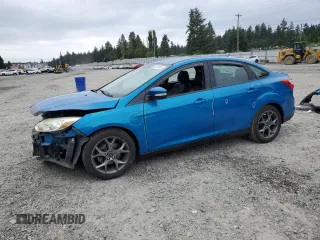 2013 Ford Focus SE with VIN 1FADP3F25DL295338, listed as a Copart auction lot 60225485 with 82,979 mi miles and Salvage title. Bid and sale history available at DreamBid. Image 1.