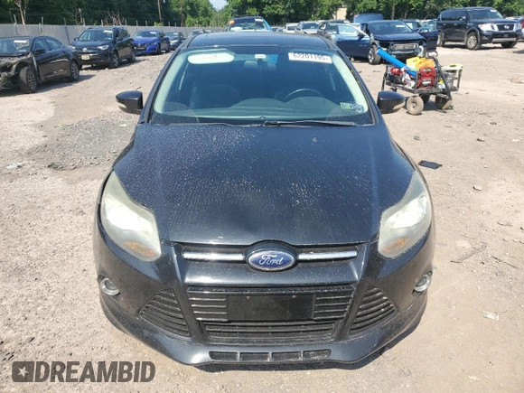 2014 Ford Focus Titanium with VIN 1FADP3N27EL251229, listed as a Copart auction lot 62201195 with 75,534 mi miles and Salvage title. Bid and sale history available at DreamBid. Image 5.