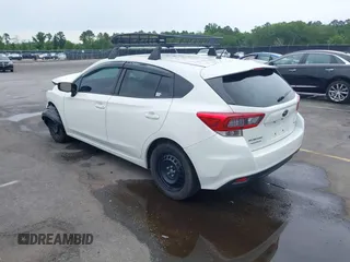 2023 Subaru Impreza with VIN 4S3GTAB6XP3706463, listed as a IAAI auction lot 42201164 with 71,572 mi miles and . Bid and sale history available at DreamBid. Image 3.