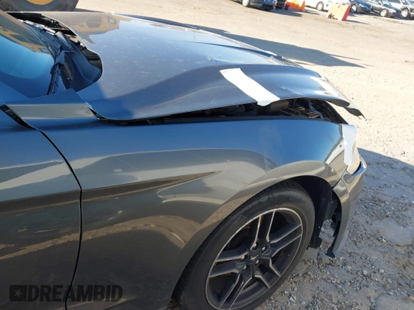 2021 Ford Mustang EcoBoost z VIN 1FATP8UH3M5105279, wystawiony jako IAAI lot #41712821 z przebiegiem 99 760 mil mil oraz . Historia ofert i sprzedaży dostępna na DreamBid. Obrazek 6.