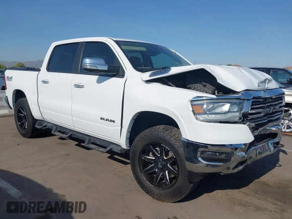 2021 Ram 1500 Laramie with VIN 1C6SRFJT7MN719238, listed as a IAAI auction lot 42482214 with 47,265 mi miles and . Bid and sale history available at DreamBid. Image 1.
