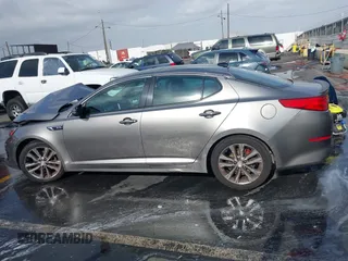 2015 Kia Optima SX Turbo with VIN 5XXGR4A69FG474261, listed as a IAAI auction lot 41103677 with 119,988 mi miles. Bid and sale history available at carsss.com. Image 14.
