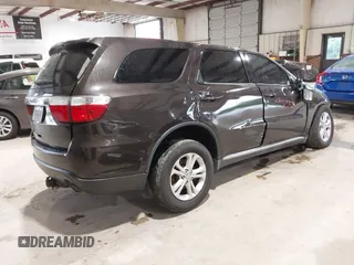 2013 Dodge Durango SXT with VIN 1C4RDJAG3DC540038, listed as a IAAI auction lot 42366965 with Not provided miles and . Bid and sale history available at DreamBid. Image 4.