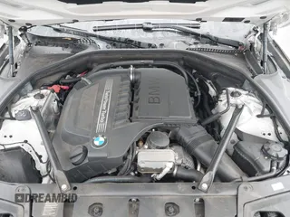2014 BMW 5 Series 535i with VIN WBA5B1C57ED475963, listed as a IAAI auction lot 41914997 with 92,037 mi miles and . Bid and sale history available at DreamBid. Image 10.