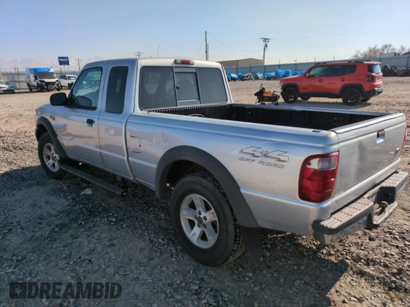 2002 Ford Ranger XL Fleet with VIN 1FTZR45E72PA98253, listed as a Copart auction lot 89013035 with 188,330 mi miles and Salvage Title. Bid and sale history available at DreamBid. Image 2.