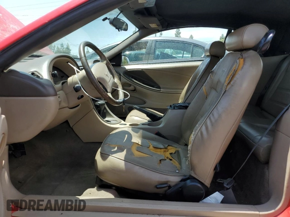 2002 Ford Mustang Deluxe z VIN 1FAFP44472F107630, wystawiony jako Copart lot #56256865 z przebiegiem 214 457 mil mil oraz Szkoda całkowita • Salvage title. Historia ofert i sprzedaży dostępna na DreamBid. Obrazek 7.
